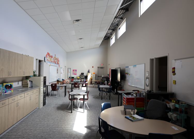 Milbank Elementary classroom with clerestory windows and small group tables