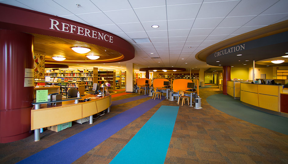 State University library entrance with reference and circulation desks